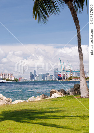 Modern skyline of Miami with towering skyscrapers, tropical vibe, and waterfront views Modern skyline of Miami with towering skyscrapers, tropical vibe, and waterfront views 141717606