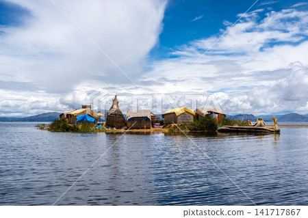 Floating island "Uros Titino" on Lake Titicaca in Peru Floating island "Uros Titino" on Lake Titicaca in Peru 141717867