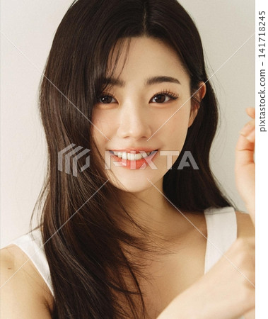 Beautiful Young Asian Woman with Natural Glowing Skin, Smooth Black Hair and Healthy Fresh Beauty Portrait Beautiful Young Asian Woman with Natural Glowing Skin, Smooth Black Hair and Healthy Fresh Beauty Portrait 141718245