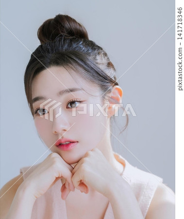 Beautiful Young Asian Woman with Natural Glowing Skin, Smooth Black Hair and Healthy Fresh Beauty Portrait Beautiful Young Asian Woman with Natural Glowing Skin, Smooth Black Hair and Healthy Fresh Beauty Portrait 141718346