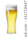 Draft beer poured into a glass 141718447