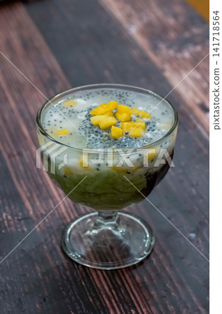 Es Teler Traditional Indonesian Mixed Fruit Dessert with Avocado, Jackfruit and Basil Seeds 141718564