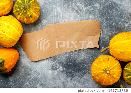 Halloween gingerbread cookies with autumn pumpkins and leaves Halloween gingerbread cookies with autumn pumpkins and leaves 141718786