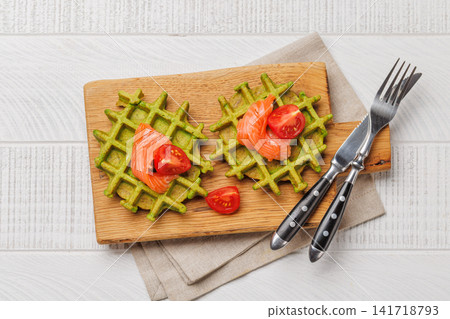 Vegan spinach waffles top view Vegan spinach waffles top view 141718793
