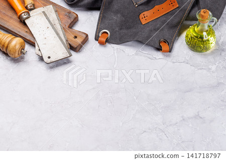 Meat cooking utensils on marble table Meat cooking utensils on marble table 141718797