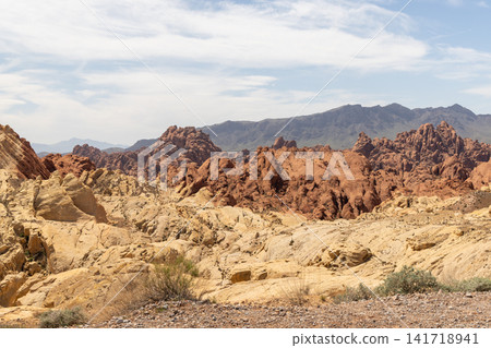 Red sandstone desert cliffs with blue sky dramatic rock landscape Red sandstone desert cliffs with blue sky dramatic rock landscape 141718941