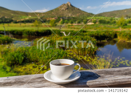 Coffee with mountain view morning Coffee with mountain view morning 141719142