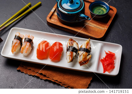 Sushi set with tea and small teapot Sushi set with tea and small teapot 141719151