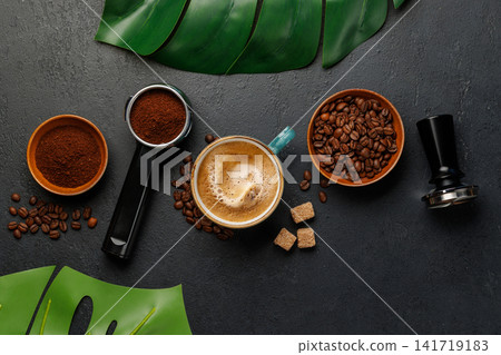 Espresso preparation tools and coffee beans flat lay composition Espresso preparation tools and coffee beans flat lay composition 141719183
