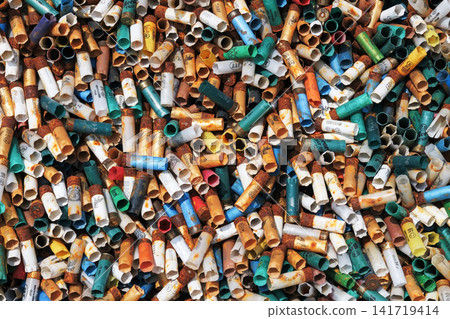 Pile of colorful plastic pipes for recycling, closeup of photo Pile of colorful plastic pipes for recycling, closeup of photo 141719414