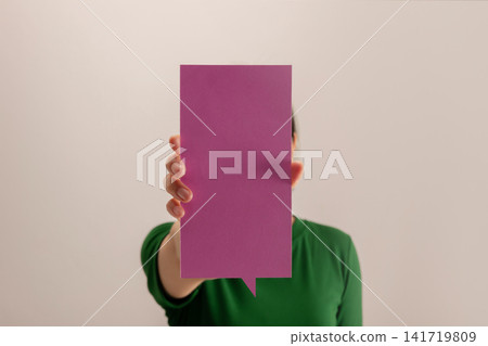 Woman holding a blank square card, communication, identity, messaging 141719809