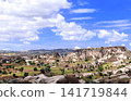 Landscape of world-famous fairy chimneys and mushroom-shaped rocks. Symbol of Cappadocia - Fairy Chimney (Multihead stone mushrooms), Pasabag Valley, Anatolia, Turkey. Topic of travel, trip, vacation 141719844