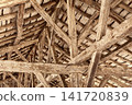 Close-up of oak beams heavily weathered to a silvery-grey patina. 141720839