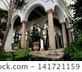 Cozy european patio with well and stairs Stock Photo 141721159
