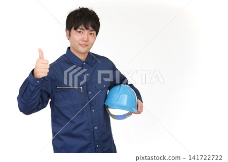 A smiling worker with a helmet A smiling worker with a helmet 141722722