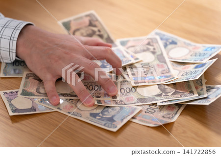 緊握金錢的手 緊握金錢的手 141722856
