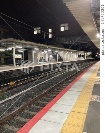 The station platform and tracks at night The station platform and tracks at night 141723391