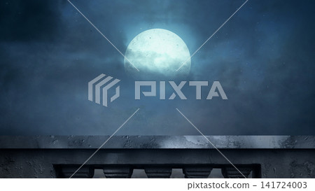 A view from a stone balcony looking out at a bright full moon shining through dramatic, moody night clouds in a dark blue sky. Halloween background A view from a stone balcony looking out at a bright full moon shining through dramatic, moody night clouds in a dark blue sky. Halloween background 141724003