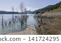 Abandoned road leading into the waters of Lake Shuparo, Yubari City, Hokkaido 141724295