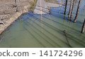 Abandoned road leading into the waters of Lake Shuparo, Yubari City, Hokkaido 141724296