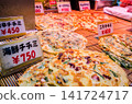 Various kinds of jeon (Korean pancakes) lined up in front of shops in Osaka's Koreatown in Tsuruhashi 141724717