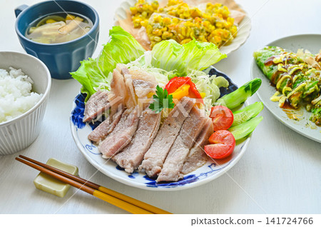 Salt-fermented pork steak made from three-breed pork, served with colorful vegetables. Salt-fermented pork steak made from three-breed pork, served with colorful vegetables. 141724766