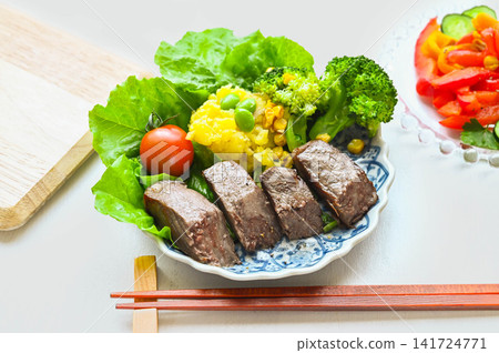A plate of Miyazaki Prefecture beef steak and vegetables. A plate of Miyazaki Prefecture beef steak and vegetables. 141724771