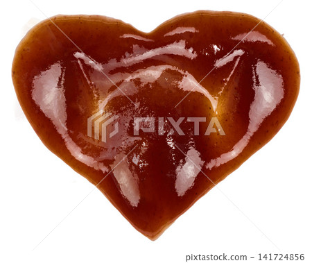 Spilled barbecue sauce in heart shape on isolated background Spilled barbecue sauce in heart shape on isolated background 141724856