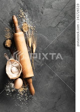 Rustic Baking Scene with Rolling Pin and Ingredients 141726519