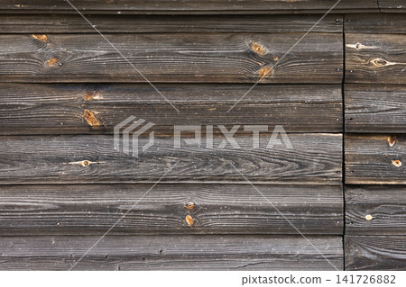 Close-up of weathered horizontal wooden siding showing natural grain Close-up of weathered horizontal wooden siding showing natural grain 141726882