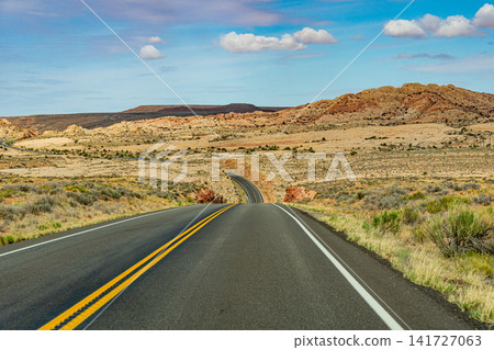 A stunning view of the red earth landscape of Navajo Springs from Highway 163 (Western USA) A stunning view of the red earth landscape of Navajo Springs from Highway 163 (Western USA) 141727063