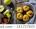 Whole Baked green apples in a glass baking dish 141727605