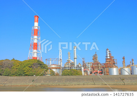 A view of a petrochemical complex with many factory facilities in Yokkaichi City, Mie Prefecture A view of a petrochemical complex with many factory facilities in Yokkaichi City, Mie Prefecture 141727635