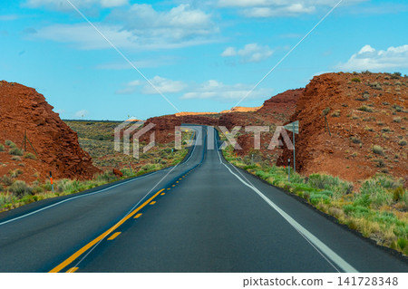 A stunning view of the red earth of the Utah wilderness from Highway 163 (Western USA) A stunning view of the red earth of the Utah wilderness from Highway 163 (Western USA) 141728348