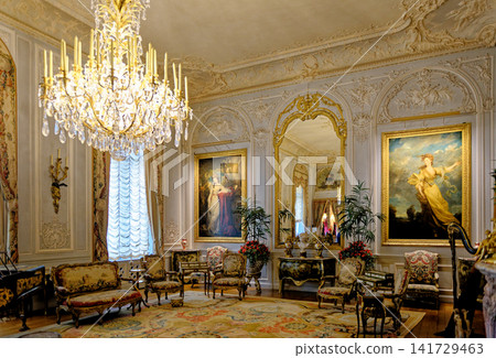 The opulent Grey Drawing Room with crystal chandeliers and a grand piano at Waddesdon Manor The opulent Grey Drawing Room with crystal chandeliers and a grand piano at Waddesdon Manor 141729463