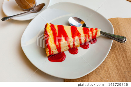 Piece of delicious currant cheesecake 141729826