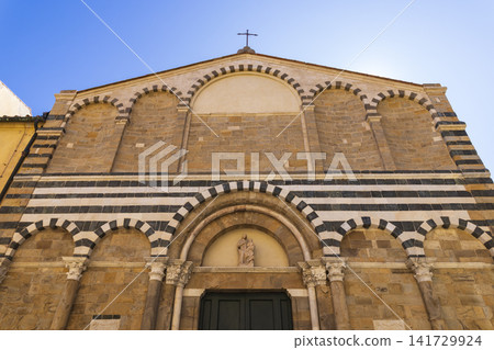 Volterra cathedral facade showing Romanesque architecture and striped design Volterra cathedral facade showing Romanesque architecture and striped design 141729924