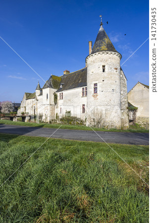 Chemery castle with a turret against blue sky Chemery castle with a turret against blue sky 141730435