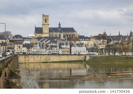 Nevers cityscape along Loire river from Pont de Loire Nevers cityscape along Loire river from Pont de Loire 141730436