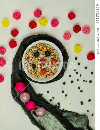 Christmas dessert Kutia on a modern table. Christmas modern sweet meal in Ukraine. Christmas dessert Kutia on a modern table. Christmas modern sweet meal in Ukraine. 141731199