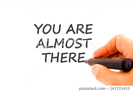 You are almost there words symbol. Concept words You are almost there on beautiful white paper. Beautiful white background. Business You are almost there motivational support concept. Copy space. You are almost there words symbol. Concept words You are almost there on beautiful white paper. Beautiful white background. Business You are almost there motivational support concept. Copy space. 141731453
