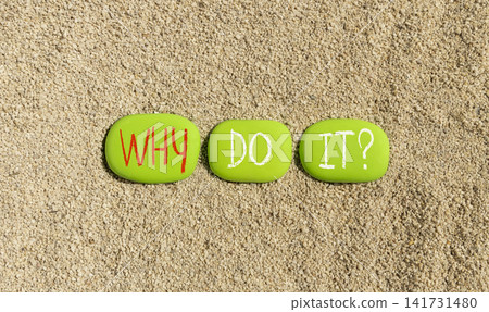 Why do it words symbol. Concept words Why do it on beautiful green stones. Beautiful sand background. Business support motivational and Why do it concept. Copy space. Why do it words symbol. Concept words Why do it on beautiful green stones. Beautiful sand background. Business support motivational and Why do it concept. Copy space. 141731480