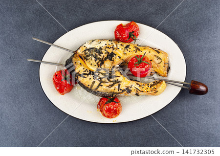 Gourmet Salmon and Trout Steak with Roasted Cherry Tomatoes and Herbs Gourmet Salmon and Trout Steak with Roasted Cherry Tomatoes and Herbs 141732305