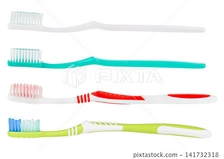 Set of four colorful plastic toothbrushes isolated on white background Set of four colorful plastic toothbrushes isolated on white background 141732318