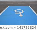 Wheelchair mark caring parking lot 141732824