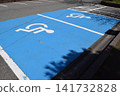 Wheelchair mark caring parking lot 141732828