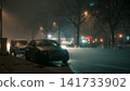 Foggy City Street at Night with Parked Cars 141733902