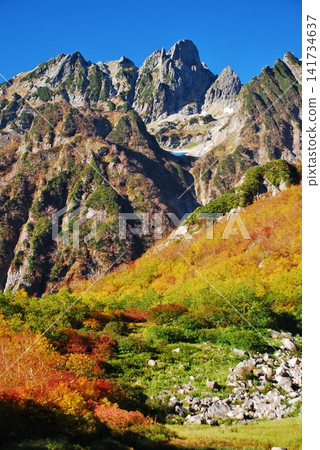 Mount Ura-Tsurugi shines brightly in the clear autumn sky. Mount Ura-Tsurugi shines brightly in the clear autumn sky. 141734637