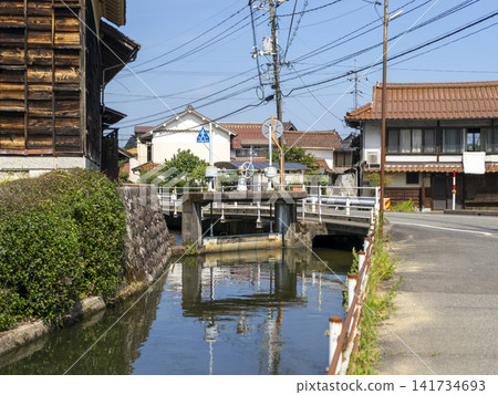 Waterways and sluice gates flowing through the town Waterways and sluice gates flowing through the town 141734693