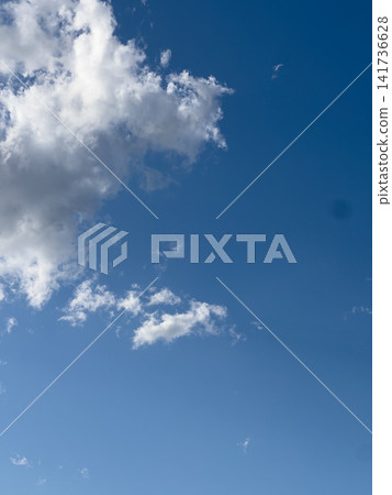 Clouds floating in the blue sky Clouds floating in the blue sky 141736628